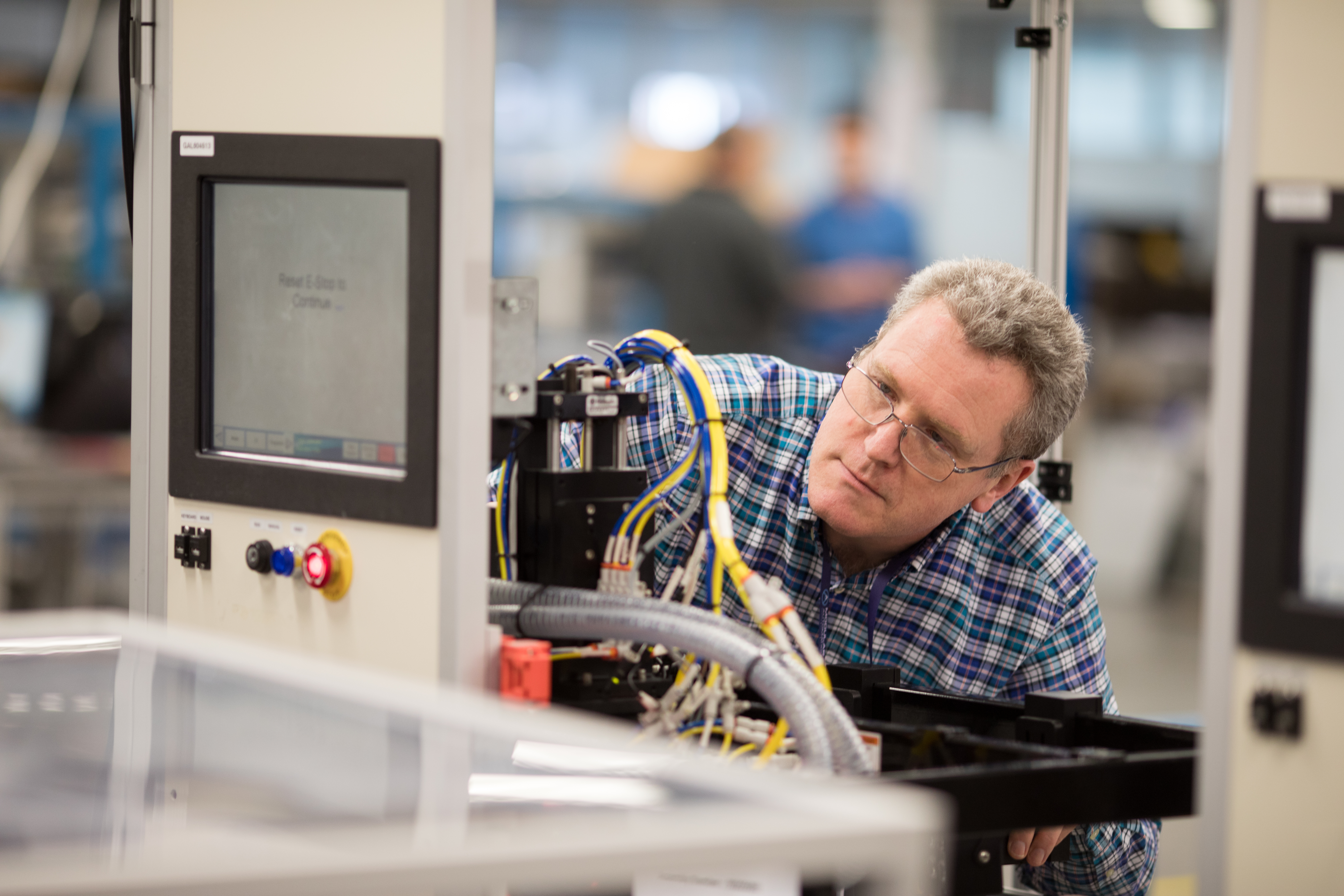 engineer reviewing cable configurations